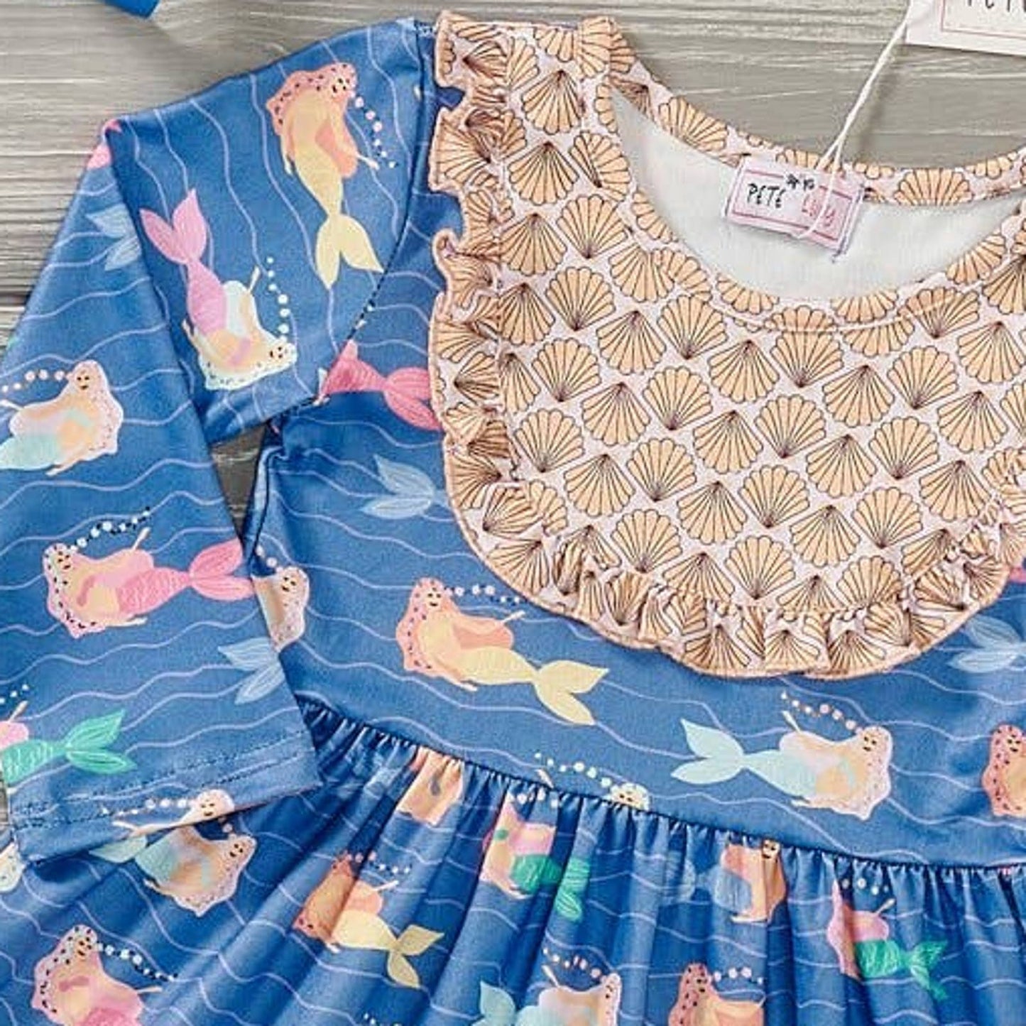 PETE + LUCY Mermaid and Shells Long Sleeve Ruffle Bib Dress